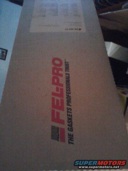 Cardboard box with FEL-PRO logo and "THE GASKETS PROFESSIONALS TRUST" text