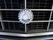 1973 Ford Ranchero - Close-up of a Mercedes-Benz emblem on a vehicle's front grille.