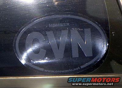 Oval sticker on a dark surface reads "MEMBER CVN" and "www.crownvic.net"