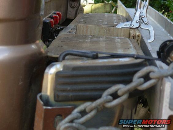 This is the 2nd pull with 2 shims, and it's just past straight.  The end hook was pulling a little too hard, so I added the black ratchet strap to distribute the load.