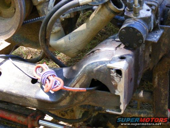 Engine block and metal frame with wires tied around it