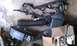 1992 Ford Bronco - Engine air intake components and a wiring harness are laid out on a concrete surface.