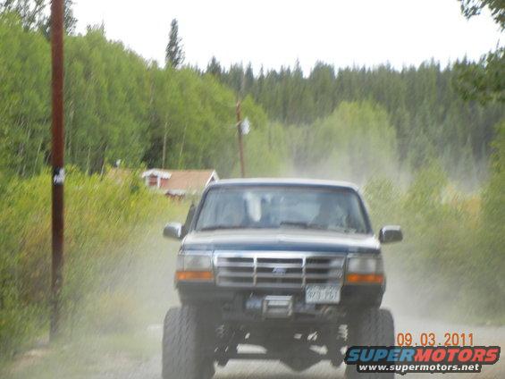 1996 Ford Bronco front view, dark blue, lifted