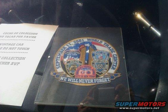 Memorial patch for 9/11 World Trade Center attack, with police and court seals, and 'We Will Never Forget'