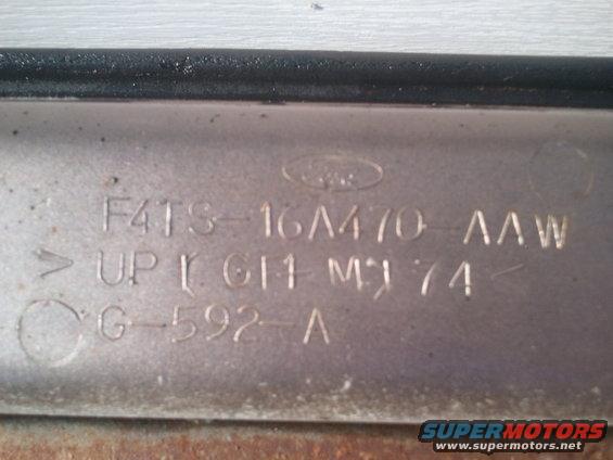 Part with Ford logo and stamped numbers, including '1974'