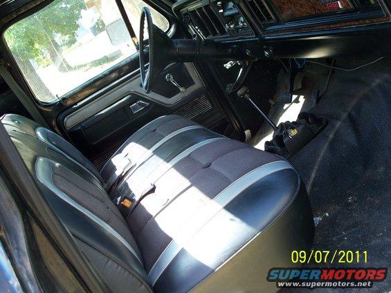 Interior view of a 1979 Ford F-250, showing the bench seat and dashboard