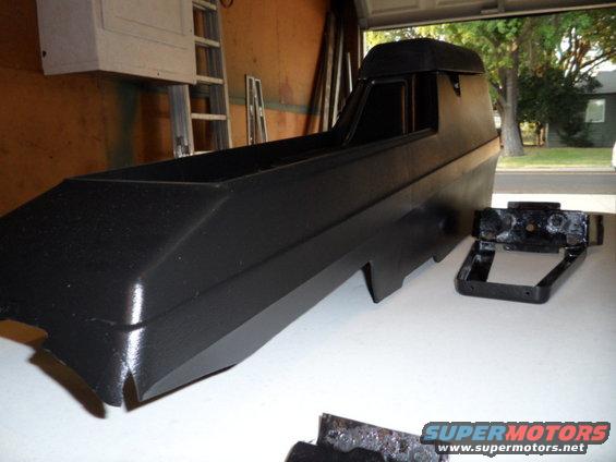 Black center console and mounting bracket