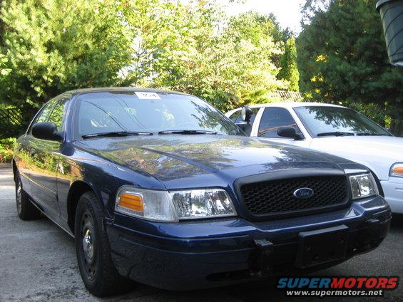 Blue 2003 Ford Crown Victoria front view