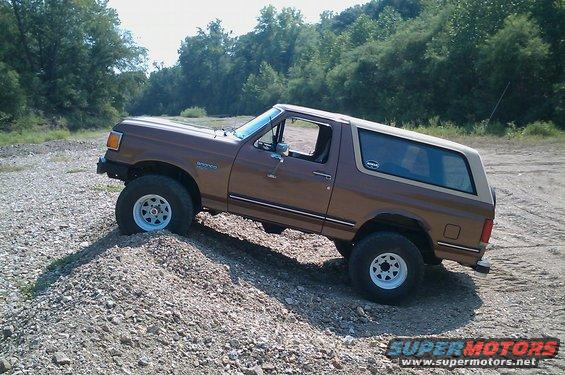 1987 Ford Bronco on gravel incline