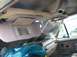 1986 Ford Bronco - Interior view of a 1986 Ford Bronco, showing the dashboard, visor, and sunshade.