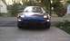 1994 Ford Probe - Front view of a blue 1994 Ford Probe, its distinctive pop-up headlights.