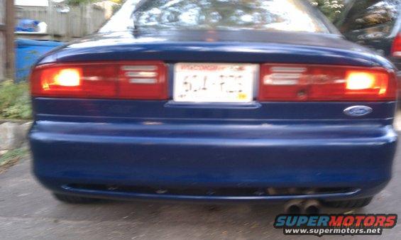 1994 Ford Probe rear view with taillights on. License plate reads 6DU-P25
