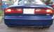 1994 Ford Probe - Rear view of a blue 1994 Ford Probe, showing taillights and license plate.