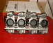1999 Kawasaki H2C - Mikuni RS Series Radial Flat Slide Carburetors are shown with their original packaging and documentation.