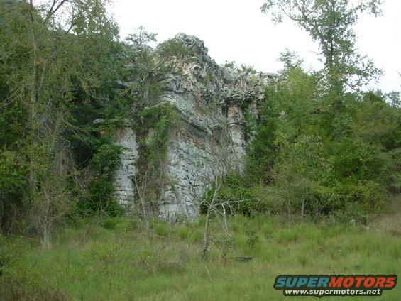 19castlerock.jpg No one mentioned this feature, so I don't know if it has a name, but it just jumps up out of the trees like something you'd expect to find in Africa or Australia.  We didn't try to climb it or drive to the top, but it was tempting.  This face is at least 25 feet high.