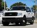 2006 Ford F-150 - Front view of a white 2006 Ford Expedition SUV with black accents.