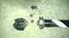 1989 Ford Bronco - Disassembled driveshaft components, including a U-joint and yoke, lie scattered on a concrete surface.