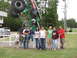 1979 Ford Bronco - A family poses for a photo in front of the Grave Digger monster truck.