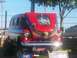 1989 Ford Bronco - Customized 1955 Chevrolet Suburban displayed with patriotic airbrush art on the hood.