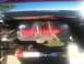 1989 Ford Bronco - A close-up view of a vehicle's rear suspension system, custom text and shock absorbers.