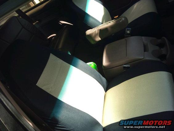 1994 Ford Bronco interior with two-tone seat covers and center console