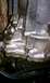 1990 Ford Bronco - Close-up of a transmission housing showing signs of a fluid leak.