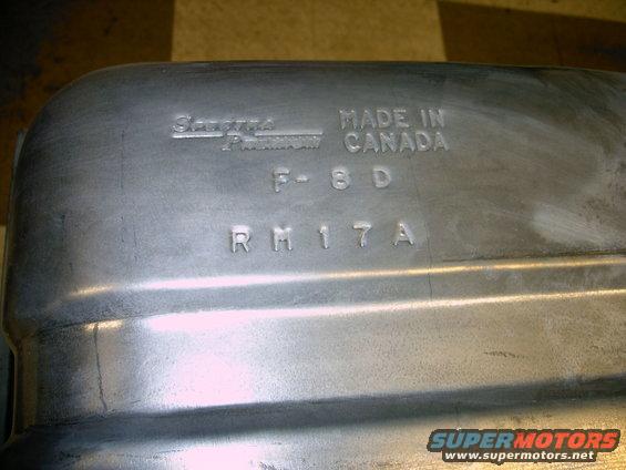 Metal fuel tank with embossed text: 'Spectra Premium', 'MADE IN CANADA', 'F-8D', 'RM17A'