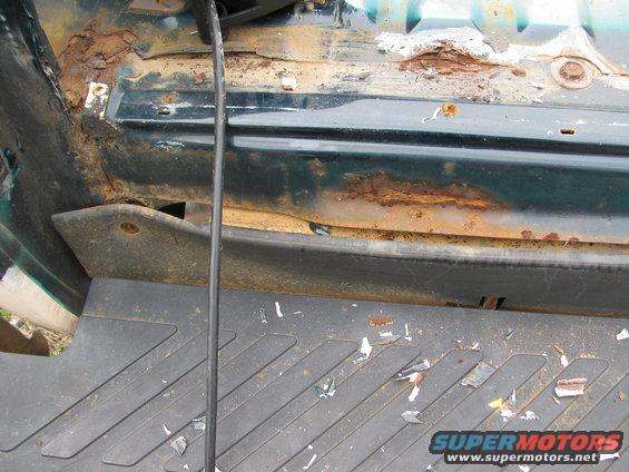 Rust on rear, along line of rear and rear bed along spot weld line