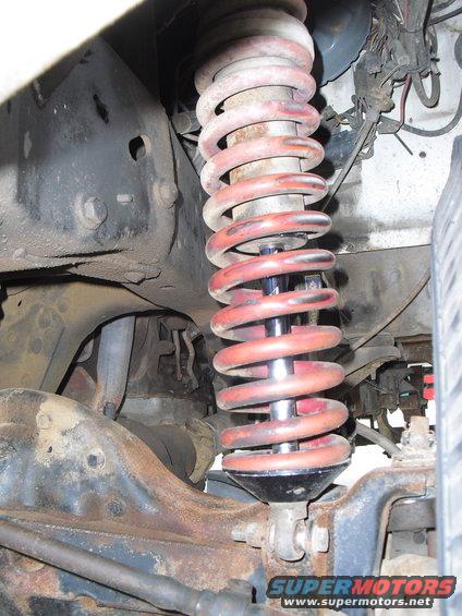 Front suspension shock absorber and red coil spring