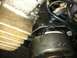 1999 Tomos Targa - Detail of a motorcycle engine component, showing wear and oil residue.