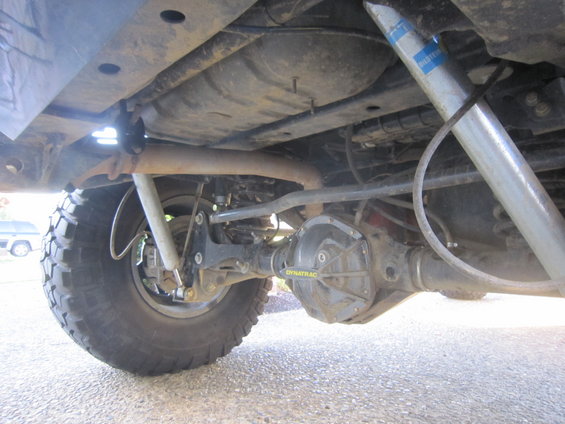 Underbody view of Dynatrac differential cover and Bilstein shocks