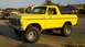 1978 Ford Bronco - This bright yellow 1978 Ford Bronco is captured from a three-quarter front view, its lifted suspension and tires.