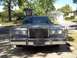 1988 Lincoln Town Car - Front view of a silver 1988 Lincoln Town Car parked in a driveway.