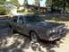 1988 Lincoln Town Car - This 1988 Lincoln Town Car is parked in front of a suburban house on a sunny day.