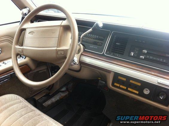 1991 Ford Crown Victoria LTD interior with beige steering wheel and dashboard
