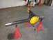 1988 Ford Bronco - A differential axle assembly is shown supported by red jack stands in a garage setting.