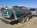 1953 Chevrolet Bel Air - This 1953 Chevrolet Bel Air is being transported on a trailer, displaying significant rust and wear.