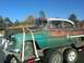 1953 Chevrolet Bel Air - This 1953 Chevrolet Bel Air sedan shows significant weathering and is secured to a trailer for transport.
