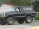 1979 Ford Bronco - This lifted black Ford Bronco has a distinctive body style from the late 1970s.