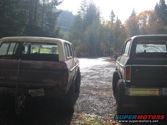 Rear view of two 1979 Ford Broncos parked outdoors