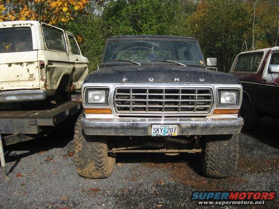 Black 1978 Ford Bronco with a chrome grille and a license plate reading SKY 207