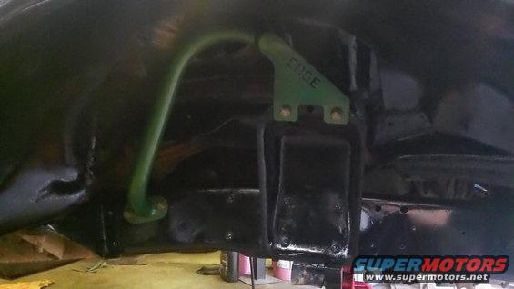 Green sway bar and bracket with 'CRGE' text on underbody