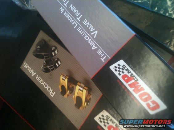 Boxes of COMP Cams rocker arms and valve train parts