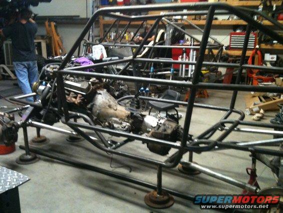 Custom tube chassis under construction with engine and transmission installed