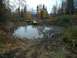 1979 Ford Bronco - Off-road vehicles tackle a challenging muddy terrain during autumn.