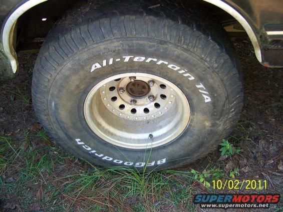 35x12.50x15 BFG All Terrains 40-50% tread.  2 showing alingment wear.  On aluminum bullet holes, 5 on 5.5.