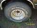 35x12.50x15 BFG All Terrains 40-50% tread.  2 showing alingment wear.  On aluminum bullet holes, 5 o...
