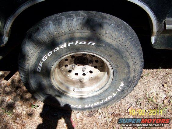 35x12.50x15 BFG All Terrains 40-50% tread.  2 showing alingment wear.  On aluminum bullet holes, 5 on 5.5.