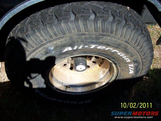 35x12.50x15 BFG All Terrains 40-50% tread.  2 showing alingment wear.  On aluminum bullet holes, 5 on 5.5.
