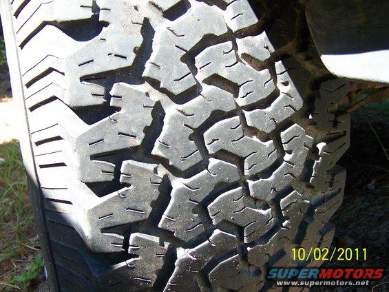 35x12.50x15 BFG All Terrains 40-50% tread.  2 showing alingment wear.  On aluminum bullet holes, 5 on 5.5.
